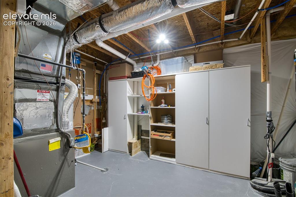 Image 29 of 32: Utility Room with storage