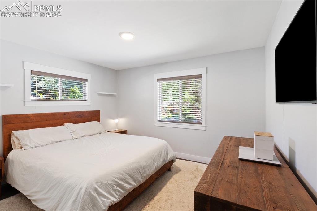 Image 15 of 31: Bedroom featuring baseboards