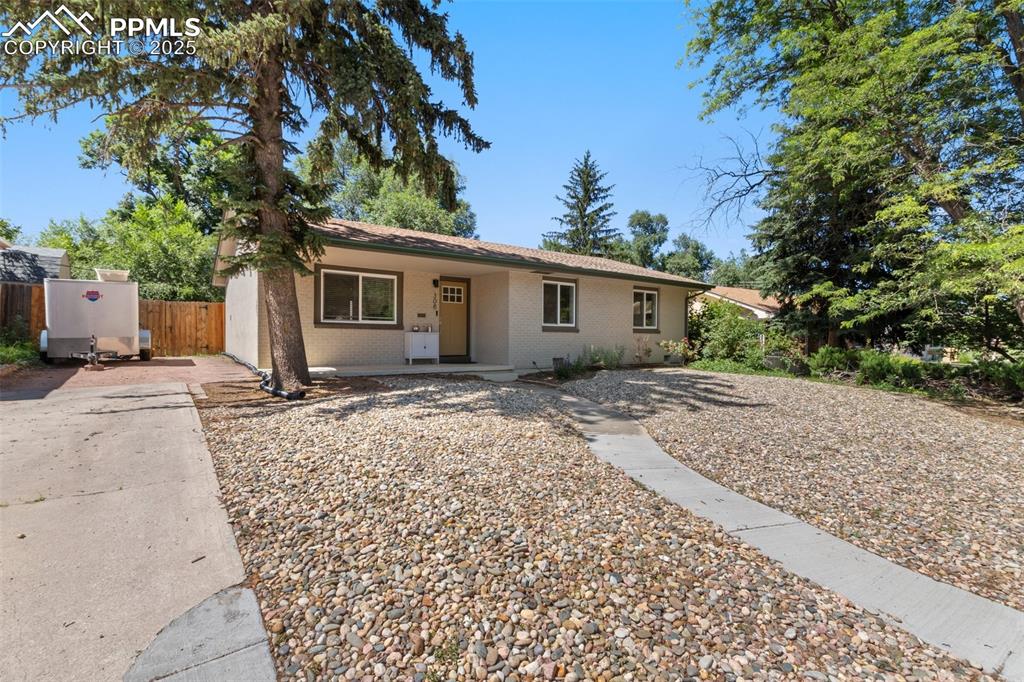 Image 2 of 31: Featuring a long concrete drive