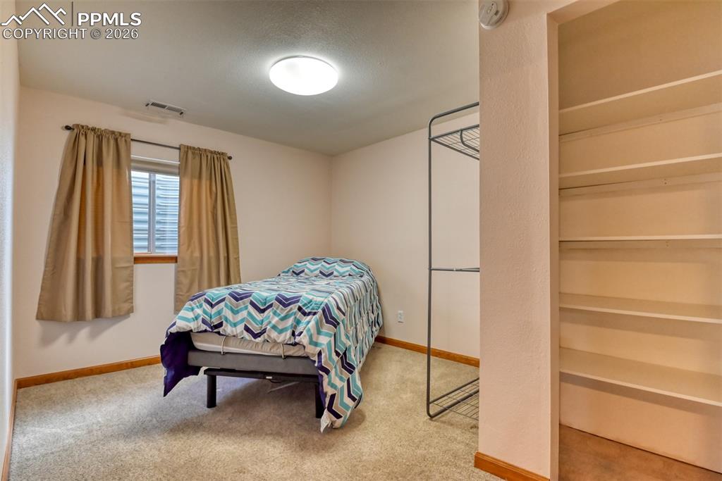 Image 40 of 50: Bedroom