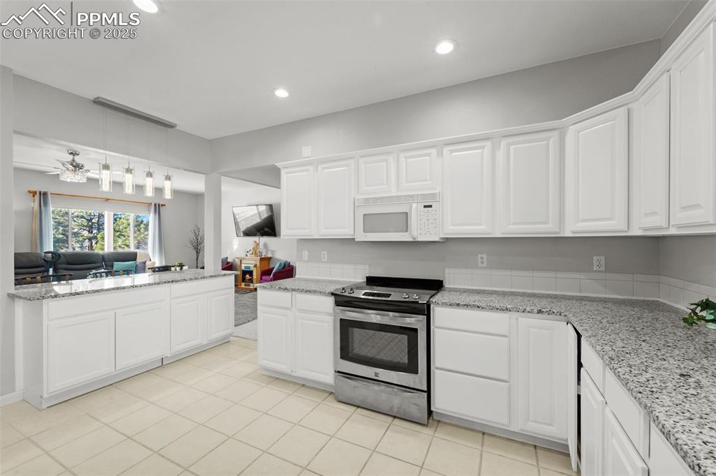 Image 12 of 47: Granite countertops.