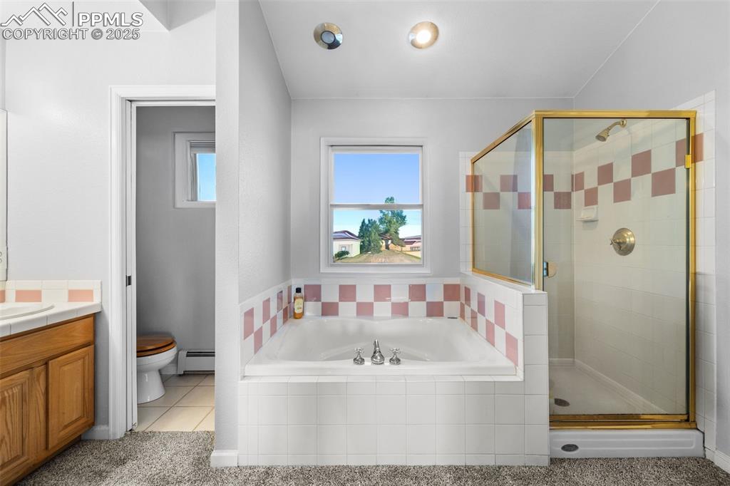 Image 31 of 47: Primary bathroom with large soaking tub. 