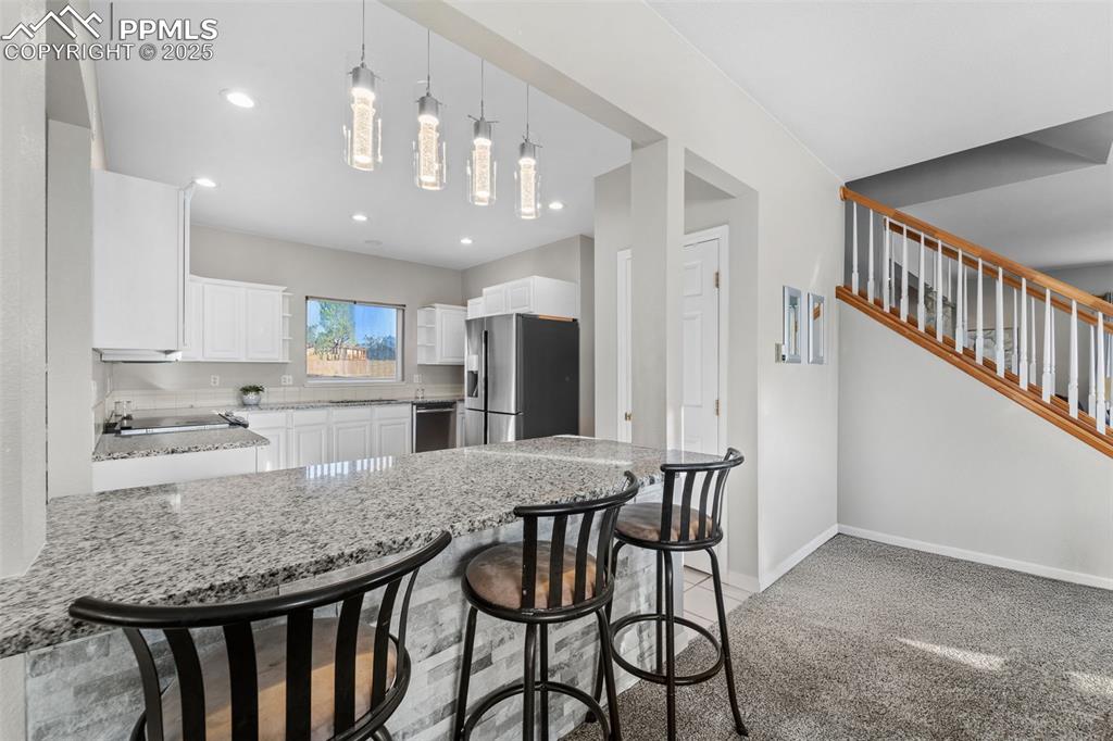 Image 8 of 47: Recently upgraded kitchen with granite countertops. 