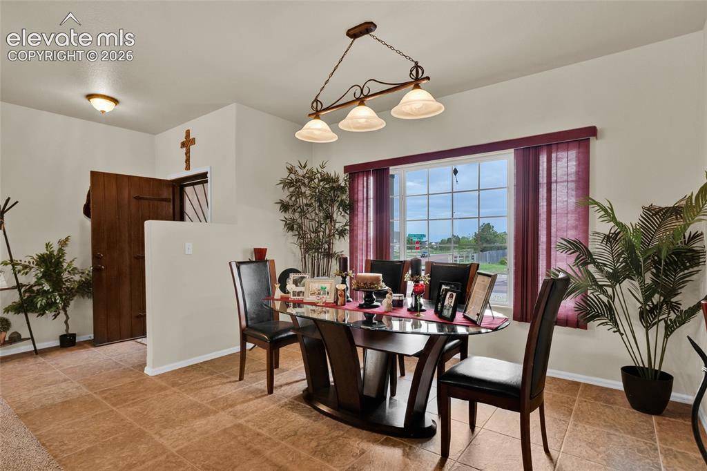 Image 10 of 50: Formal dining area