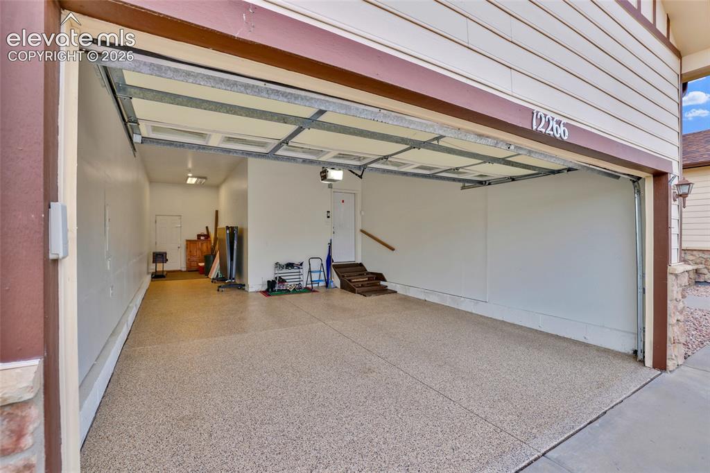 Image 33 of 50: Polyaspartic floor coating on garage floor