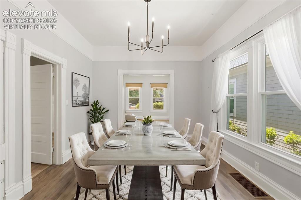Image 11 of 38: Virtually staged Dining Room