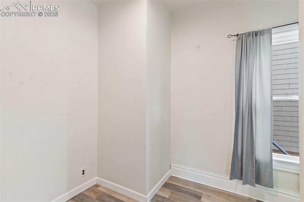 Image 30 of 38: Room off the entry perfect for an at home office space or large mud room!