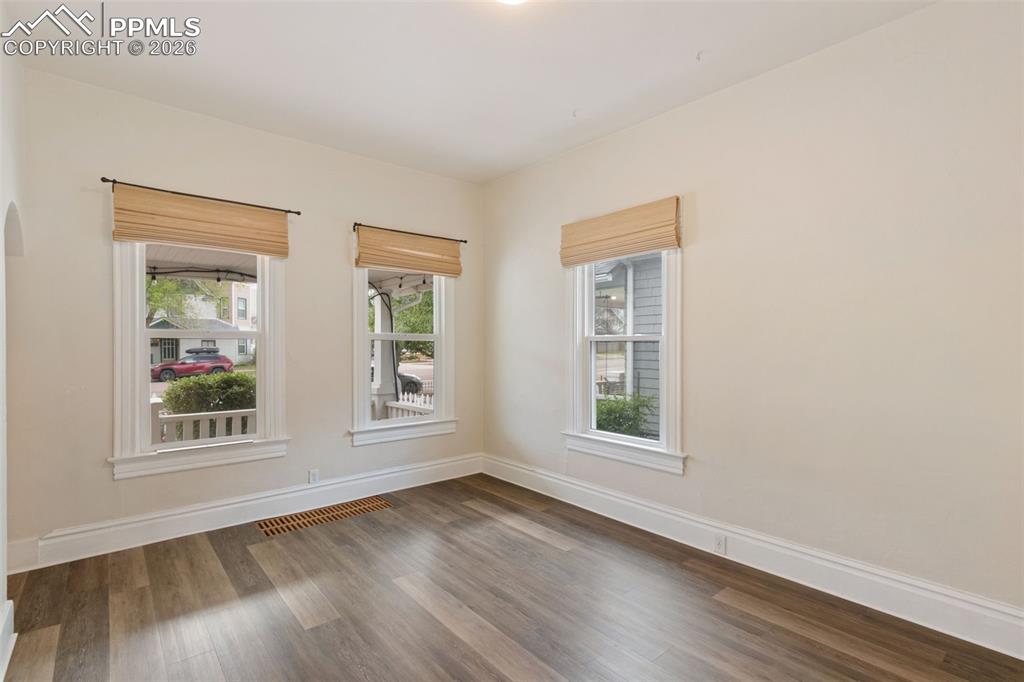 Image 9 of 38: So much natural light and extra high ceilings give the space so much of an 