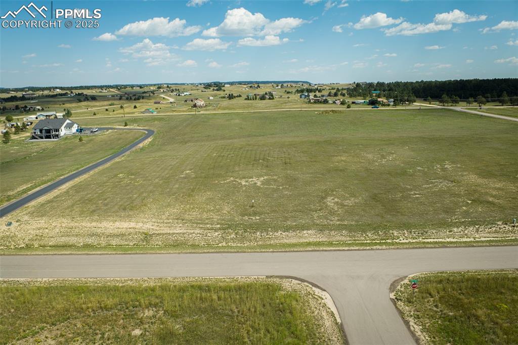 Image 2 of 14: Aerial view of sparsely populated area featuring farmland