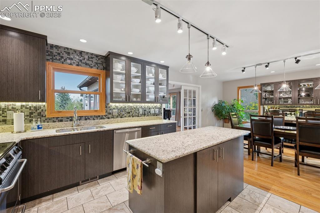 Image 17 of 50: Gourmet Kitchen With Granite And Open To Dining And Living Rooms