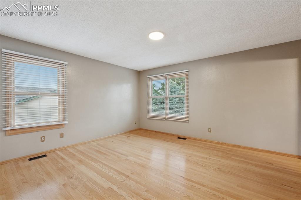 Image 20 of 50: Upper Level Primary Bedroom