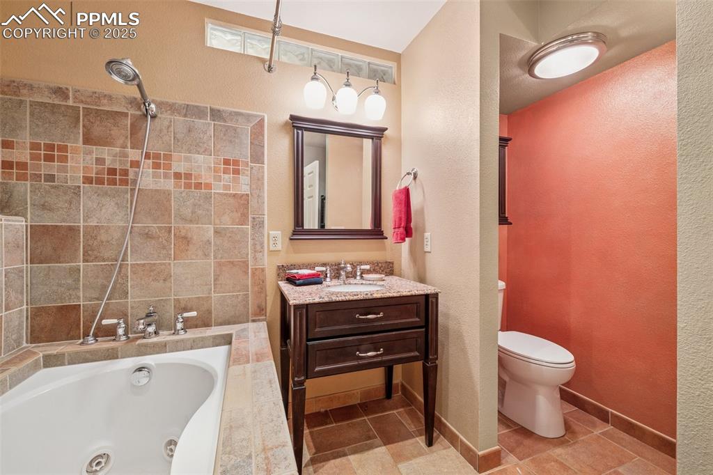 Image 26 of 50: Upper Level Full Bathroom