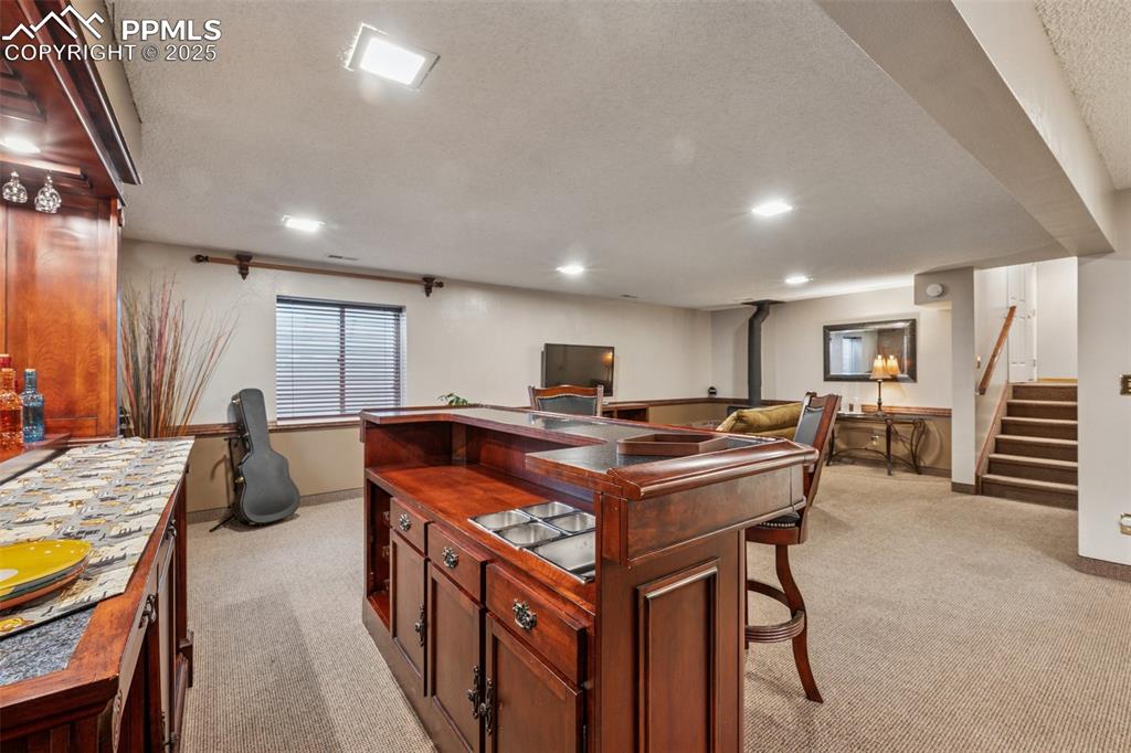 Image 32 of 50: Dry Bar in Basement