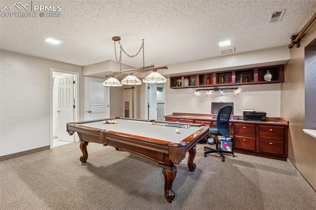 Image 36 of 50: Basement Game and Bar Area