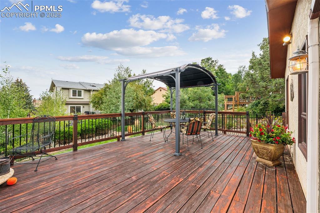 Image 42 of 50: Back Deck with Pergola
