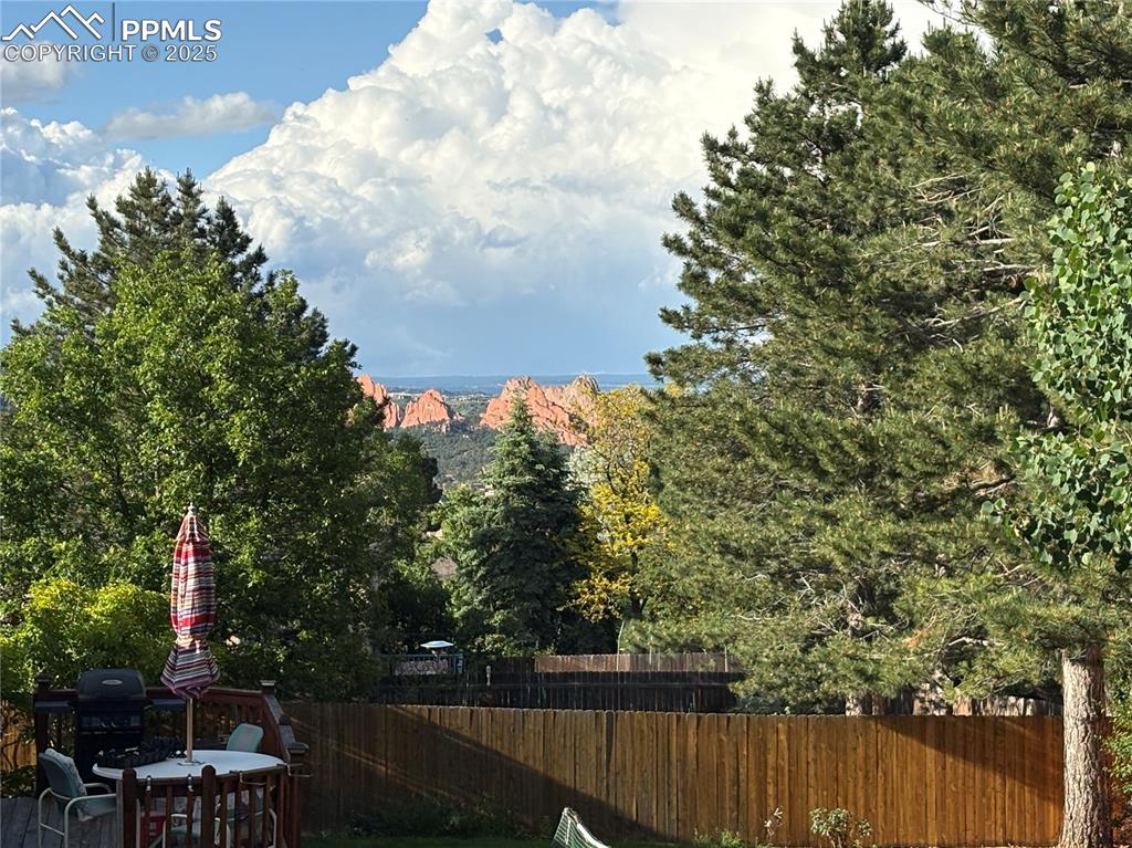 Image 7 of 50: View of Garden of the Gods from back deck