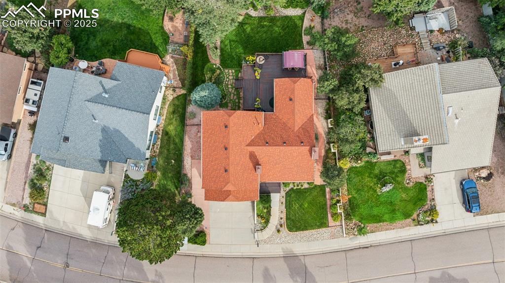 Image 8 of 50: Aerial View of Home And Yards, Red Roof