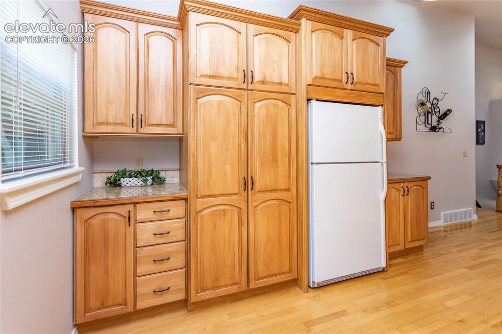 Image 14 of 48: remarkable storage enhanced by thoughtful custom features including roll-ou