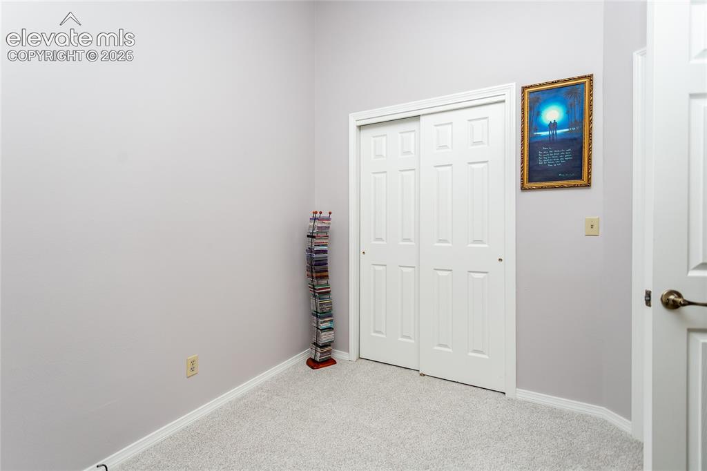 Image 20 of 48: 2nd bedroom on main floor