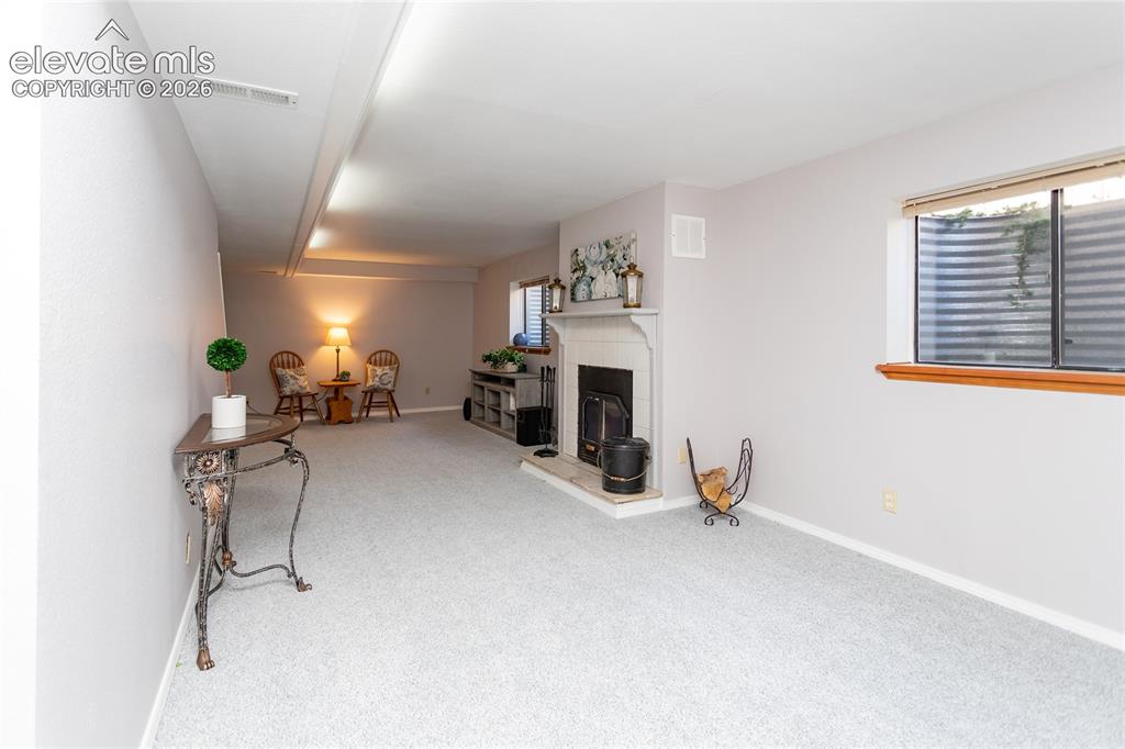 Image 32 of 48: The fully finished basement expands the home's versatility with a gener