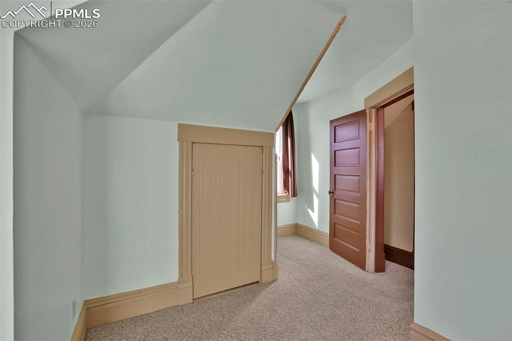 Image 35 of 48: secondary upstairs bedroom