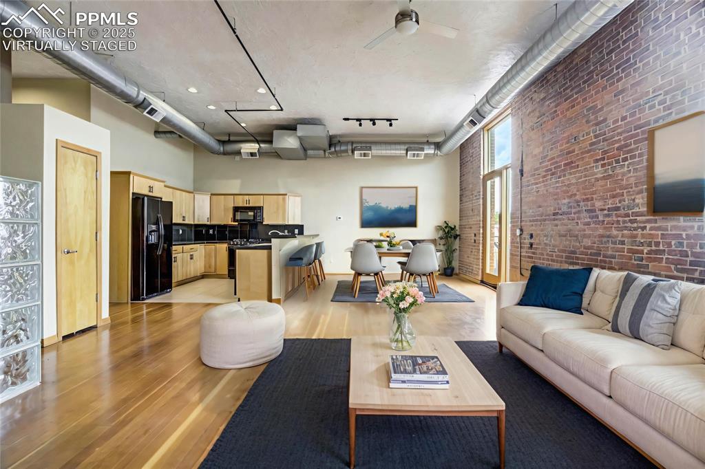 Image 5 of 43: Virtually staged living room.