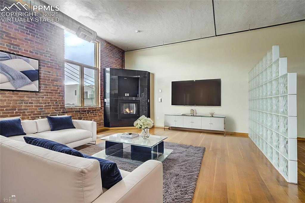 Image 7 of 43: Virtually staged living room.