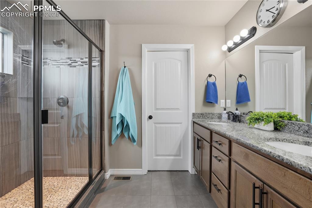 Image 18 of 49: Master Bathroom