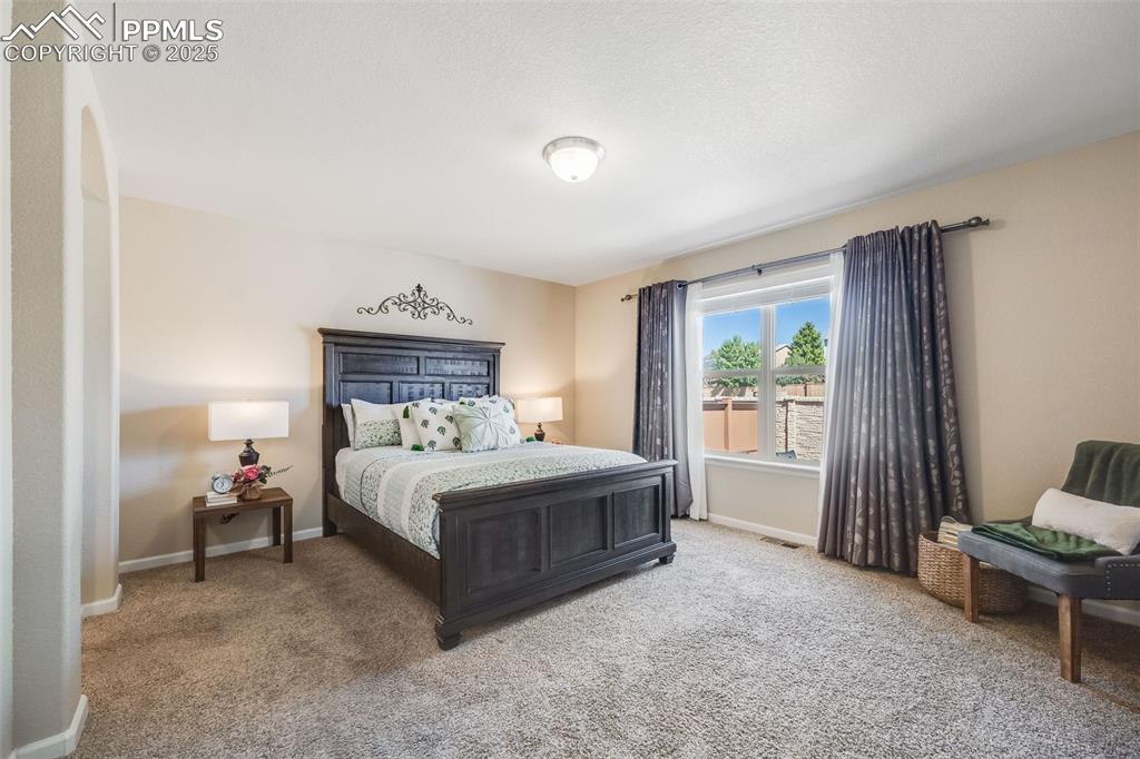 Image 15 of 44: Primary Bedroom on the main floor