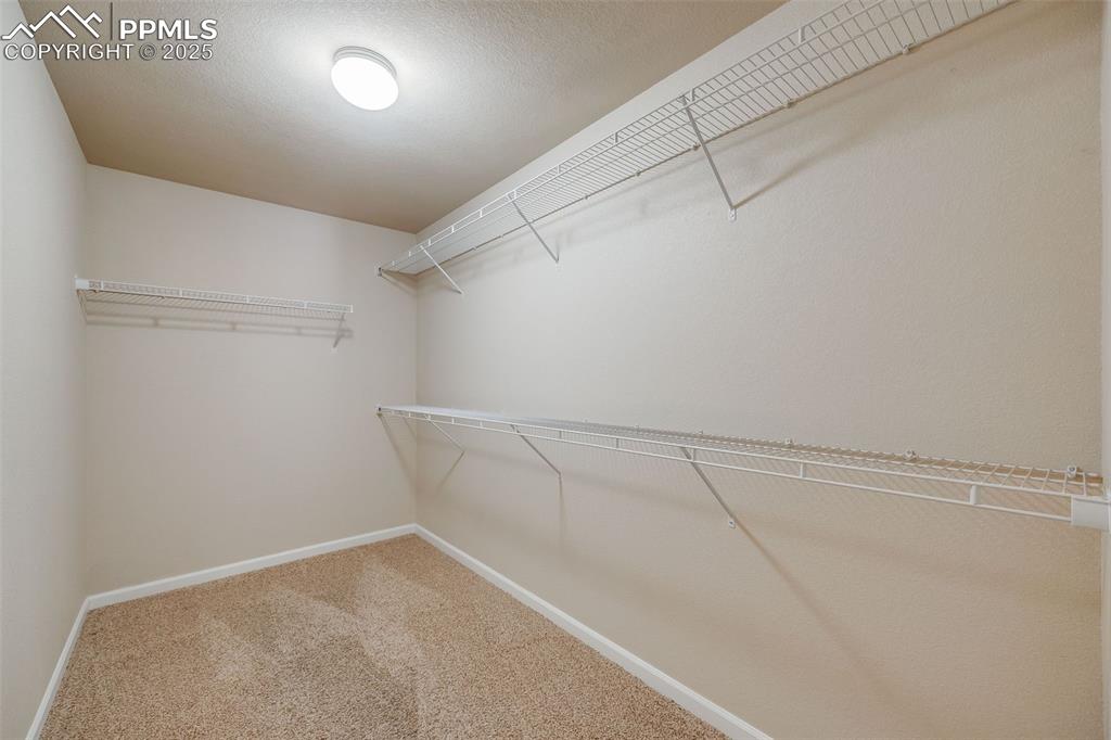 Image 19 of 44: Walk-in-Closet