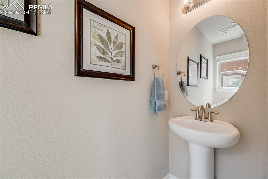 Image 21 of 44: Powder Room on the Main Floor