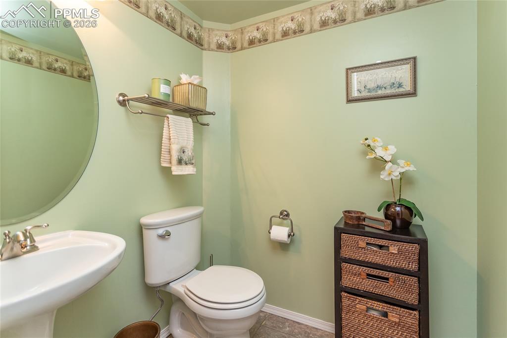Image 19 of 48: 1/2 bath on main level