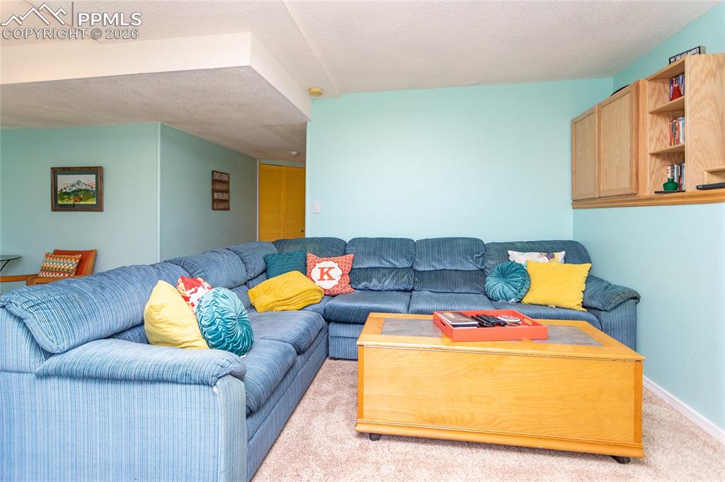 Image 32 of 48: Living area in basement