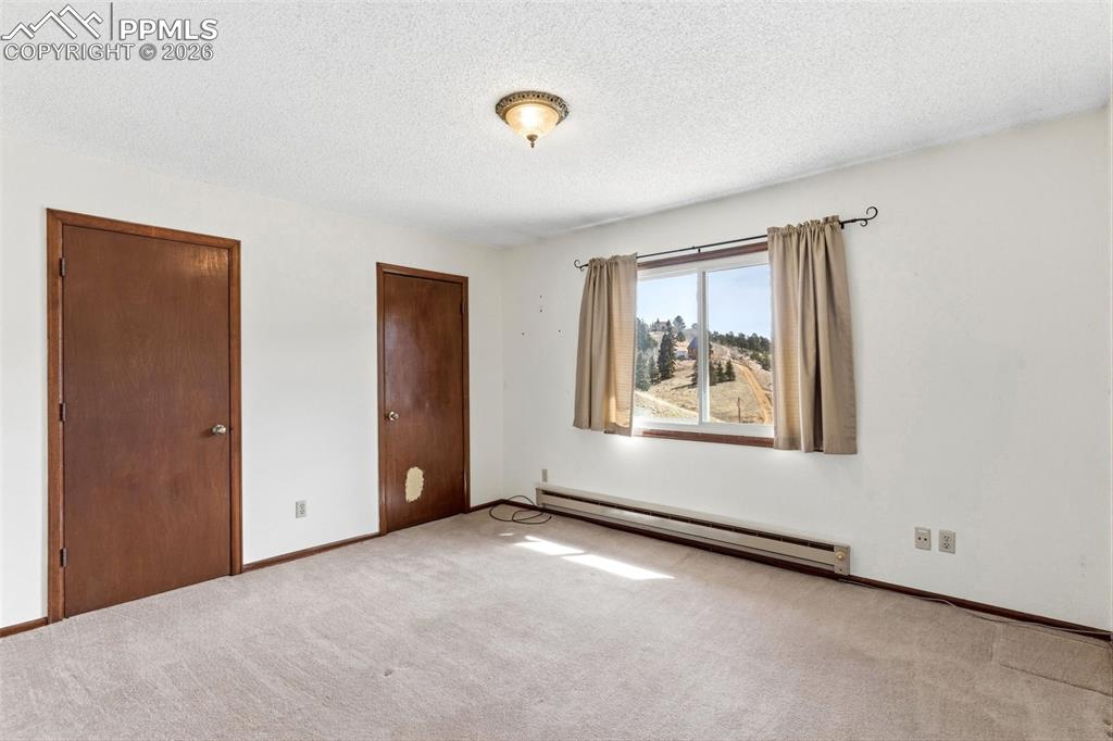 Image 22 of 49: Master Bedroom