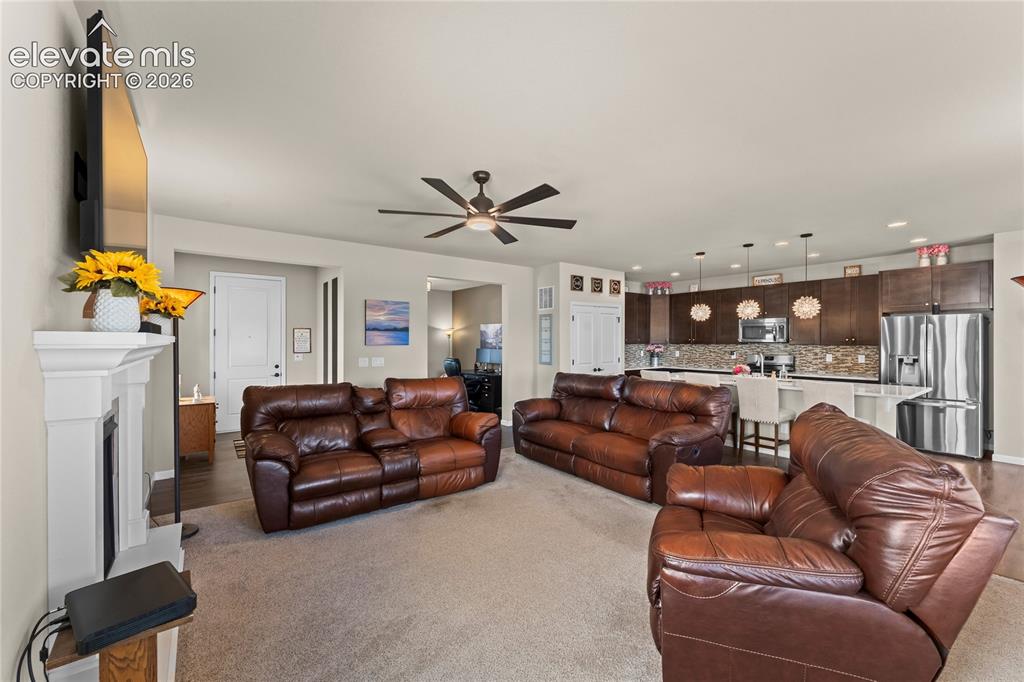 Image 11 of 41: View into spacious dining area with the luxury vinyl plank flooring, beauti