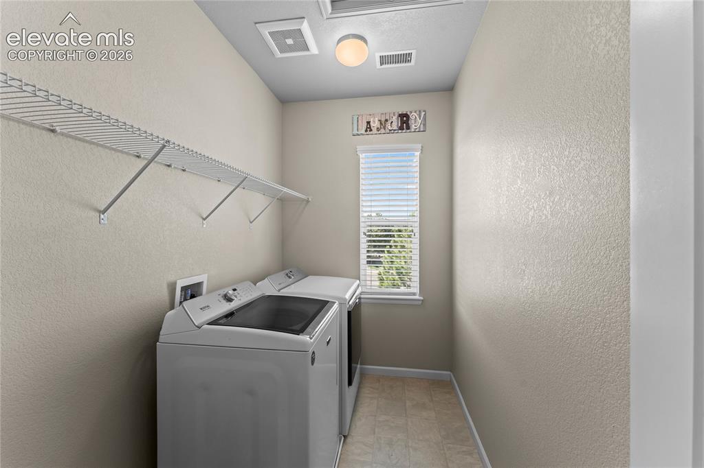 Image 23 of 41: Jack and Jill bathroom