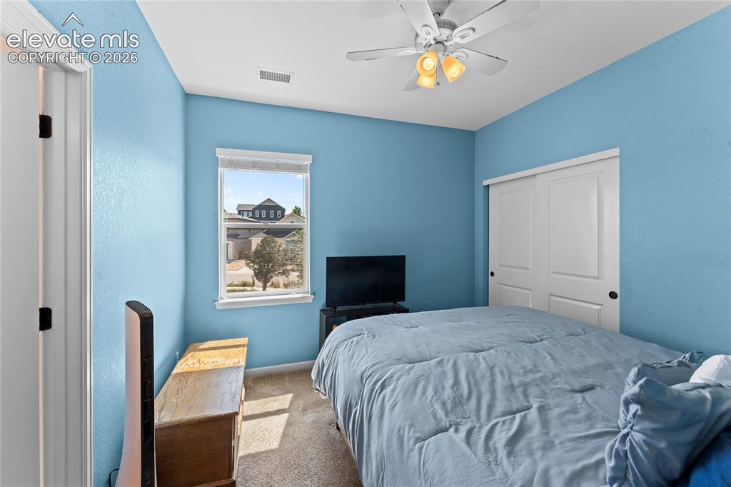 Image 29 of 41: Large primary Bedroom with tray ceiling, gorgeous attached 5-piece bath and