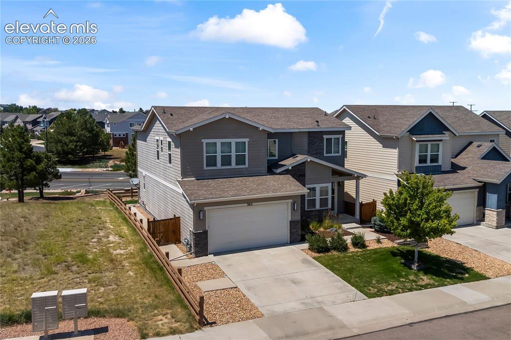 Image 3 of 49: Situated on a great corner lot with a south facing driveway where the sunsh