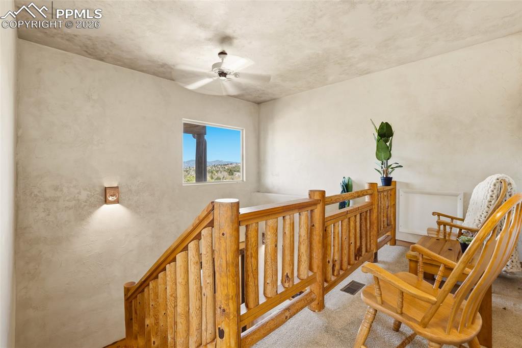 Image 17 of 39: Upstairs loft with amazing Front Range views