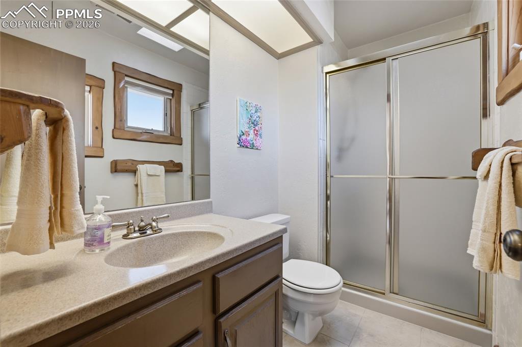 Image 24 of 39: This bath adjoins bedroom #2