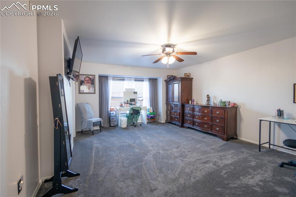 Image 23 of 34: Bathroom featuring double vanity and light tile patterned floors