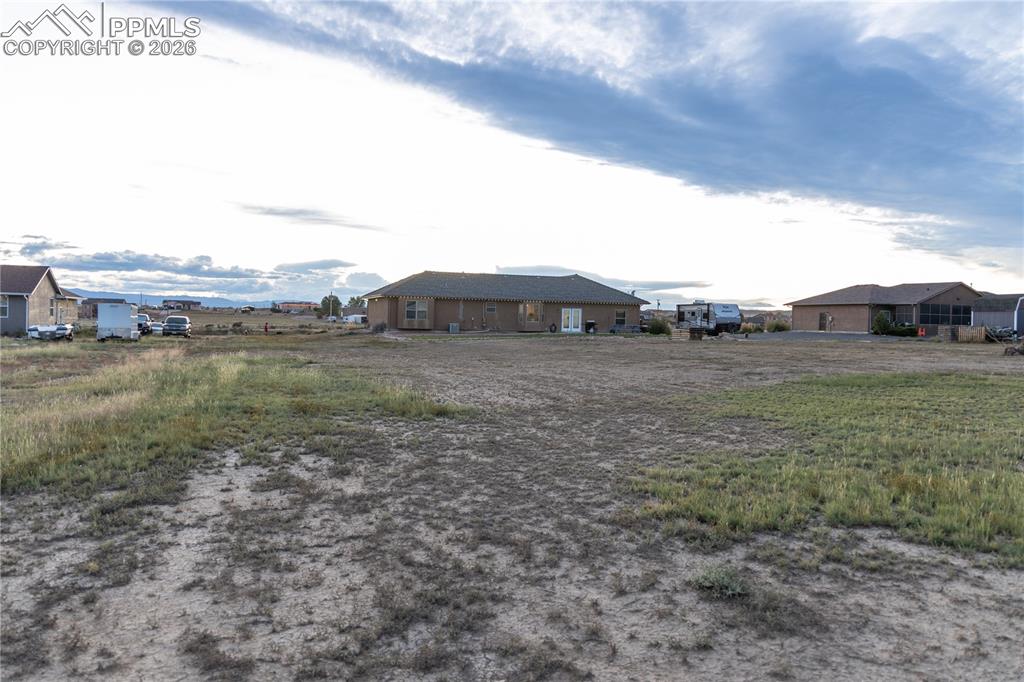 Image 34 of 34: View of yard with a residential view