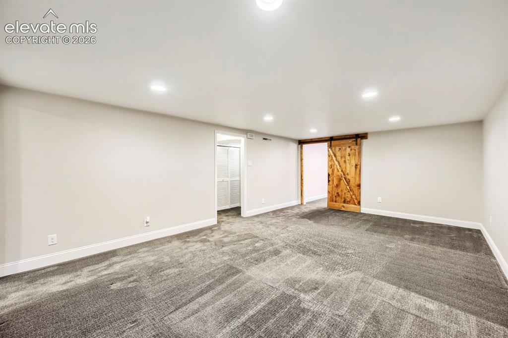Image 26 of 41: Incredible space to gather for TV, games, or just good family time!