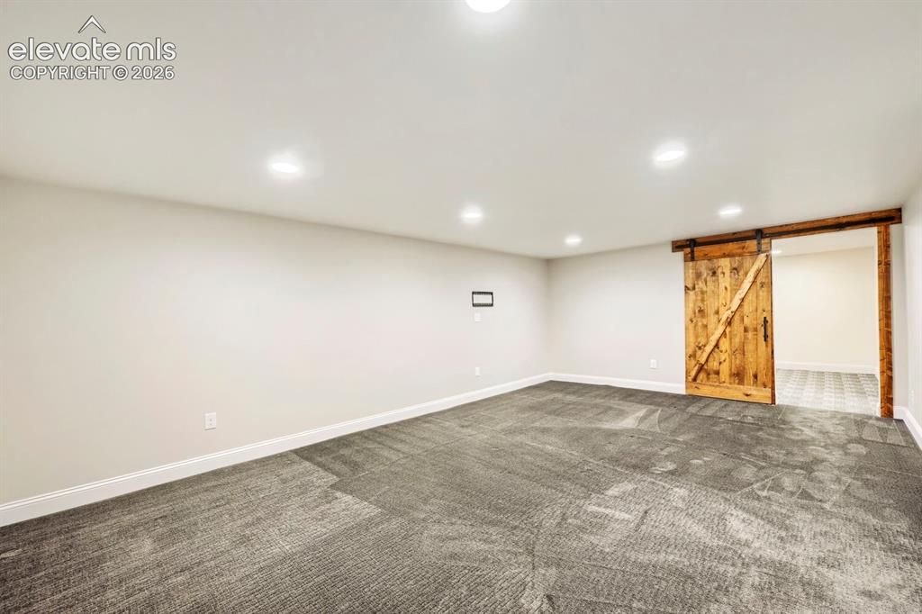 Image 27 of 41: Lower recreation/TV family room!