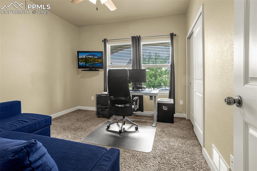 Image 12 of 48: Main level secondary bedroom