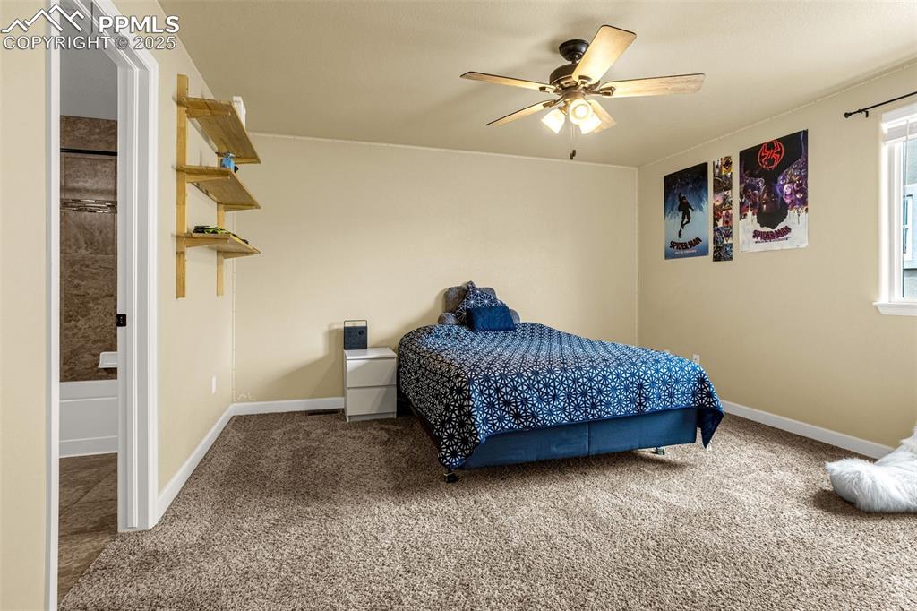 Image 28 of 48: Upstairs Bedroom with attached bathroom