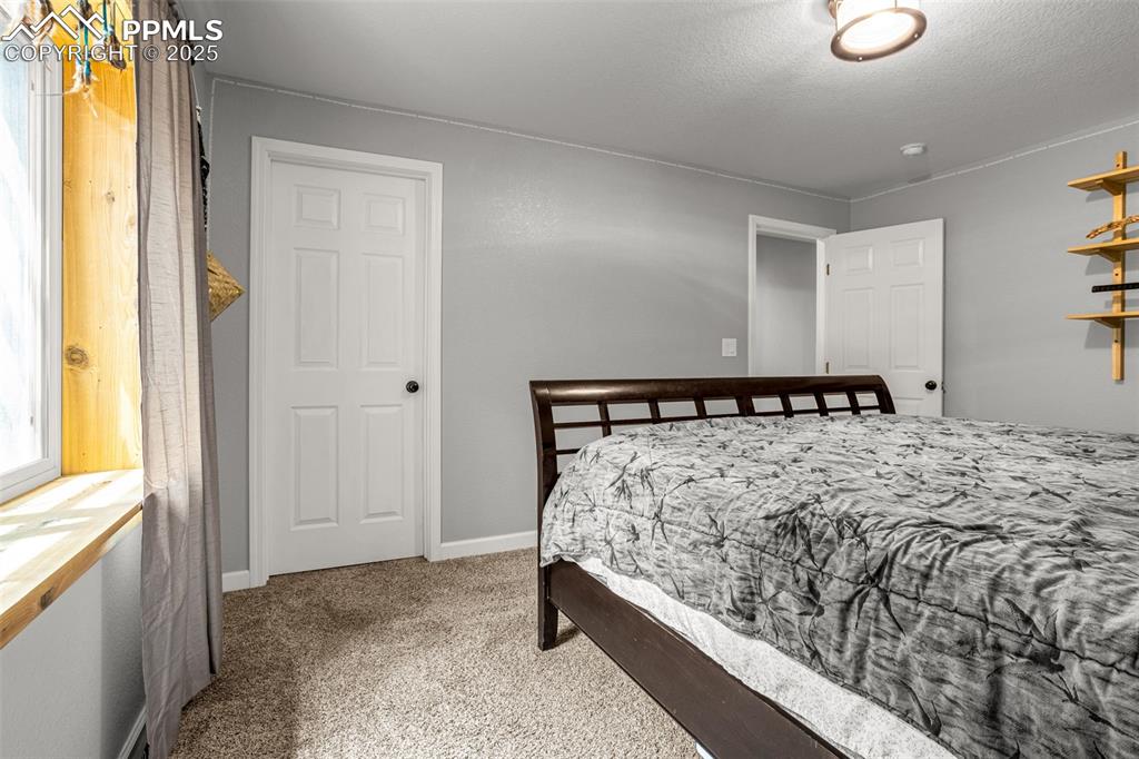 Image 35 of 48: Basement Bedroom