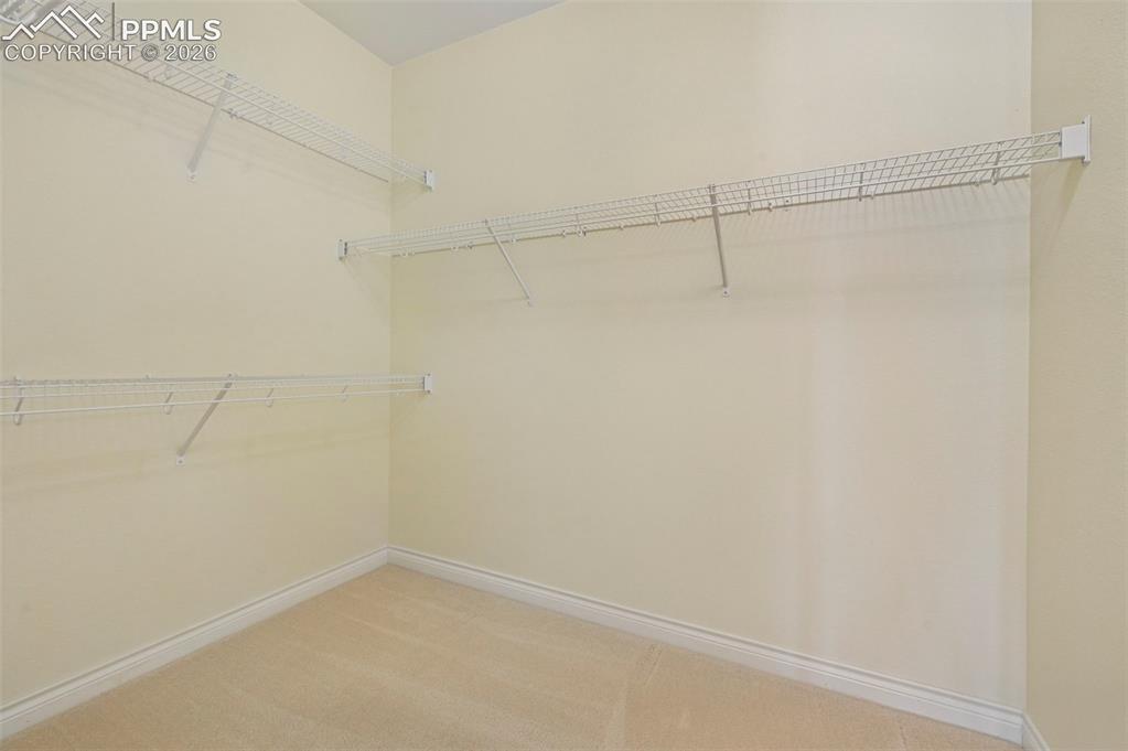 Image 30 of 48: primary suite closet