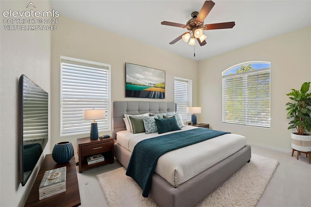 Image 34 of 50: main floor bedroom
virtually staged