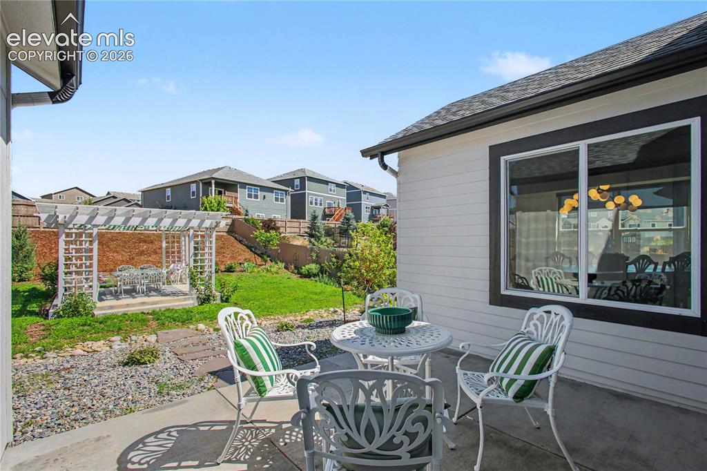 Image 8 of 38: Inviting backyard!